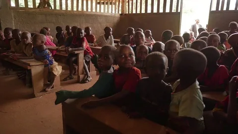Children in the classroom sit close together Stock Footage 106515686
