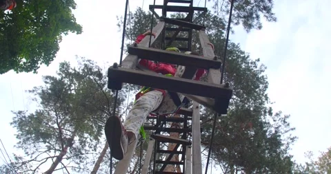 Children climbing in a park Video stock 222915146