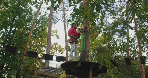 Children climbing in a park 스톡 동영상 222915355