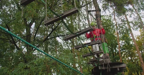 Children climbing in a park Video stock 222915918