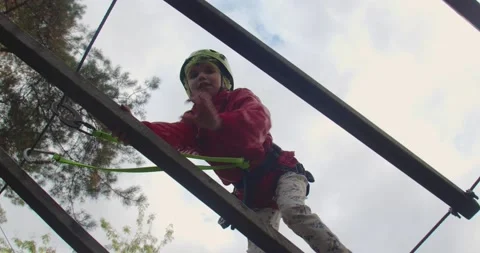 Children climbing in a park Stockbeeldmateriaal 222916607