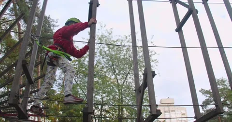 Children climbing in a park Stockbeeldmateriaal 222916796