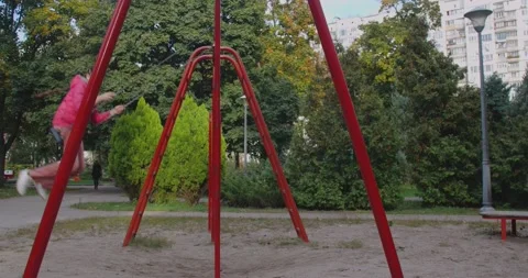 Children climbing in a park 스톡 동영상 222917623