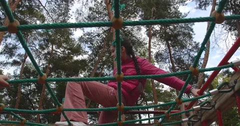 Children climbing in a park Video stock 222918493