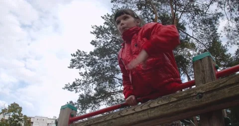 Children climbing in a park 스톡 동영상 222918528
