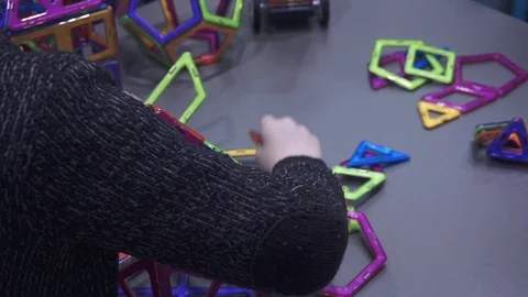 Children collect a constructor Stock Footage 82584492