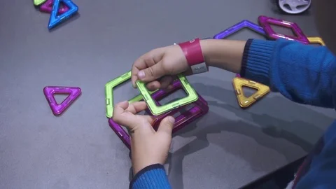 Children collect a constructor Stock Footage 82584516