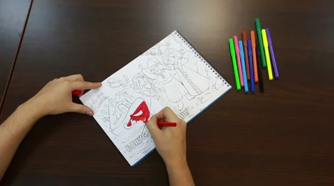 Children coloring timelapse on table Stock Footage 61539013