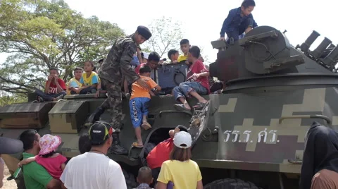 Children Coming Sit Inside and Climbing on Top the Armored Vehicle Stock Footage 66492618