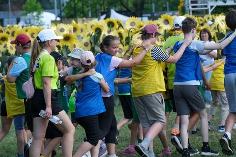 Children Completing Human Chain Maze Challenge at Sports Festival Stock Photos