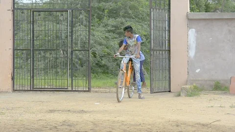 Children cycling Stock Footage 102758137