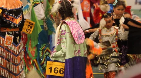 Children dance at Pow Wow during grand entry Video stock 40346597