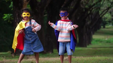 Children dancing happily in the park Stock Footage 221702583