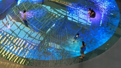 Children on Digital Light Canvas inside The Shoppes - Medium shot Stock Footage 110920116