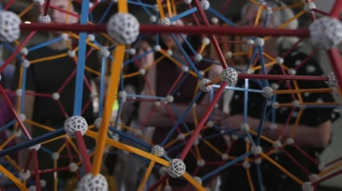 Children discovering geometric principles at a science fair. Stock Footage 50028772