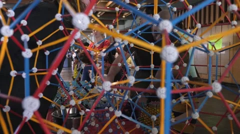 Children discovering geometric principles at a science fair. Stock Footage 50033019