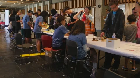Children discovering mathematical principles at a science fair. Stock Footage 50031454