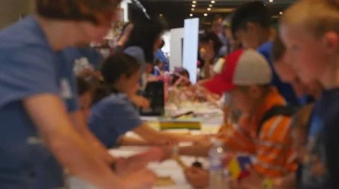 Children discovering mathematical principles at a science fair. Stock Footage 50031653