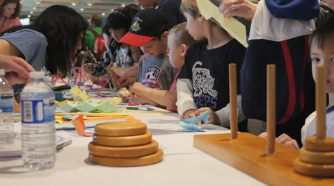 Children discovering mathematical principles at a science fair. Stock Footage 50031992