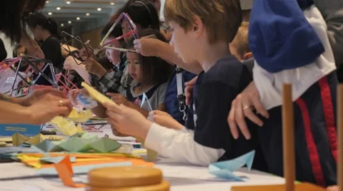 Children discovering mathematical principles at a science fair. Stock Footage 50032031
