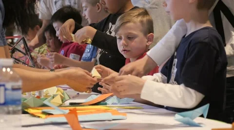 Children discovering mathematical principles at a science fair. Stock Footage 50032166