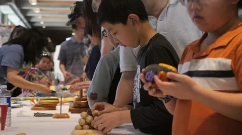 Children discovering mathematical principles at a science fair. Stock Footage 50032194