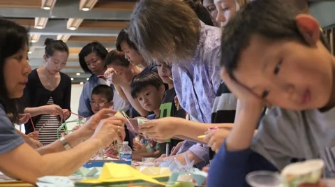 Children discovering mathematical principles at a science fair. Stock Footage 50032245