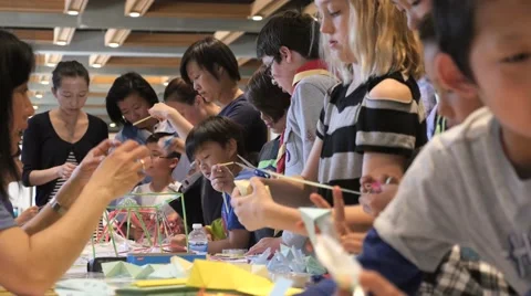 Children discovering mathematical principles at a science fair. Stock Footage 50032284