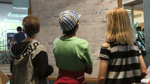 Children discovering mathematical principles at a science fair. Stock Footage 50032342