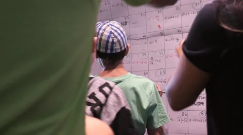 Children discovering mathematical principles at a science fair. Stock Footage 50032487