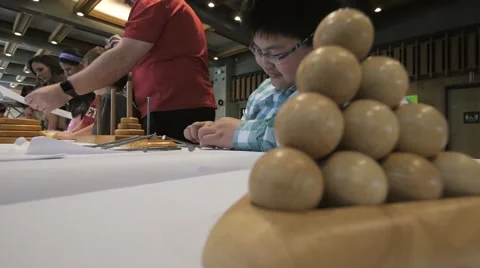 Children discovering mathematical principles at a science fair. Stock Footage 50032609