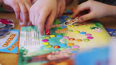Children draw and write the letters in the notebook perform tasks Stock Footage 55571849