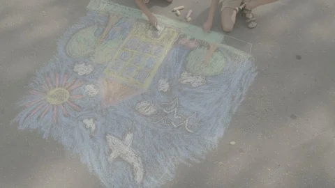 Children draw on the asphalt Stock Footage 118066063