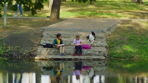 Children draw on the bridge Stock Footage 125164985