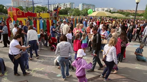 Children draw with chalk on the asphalt Stock Footage 63789494