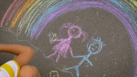 Children draw with chalk on the asphalt. Selective focus. Stock Footage 161621202
