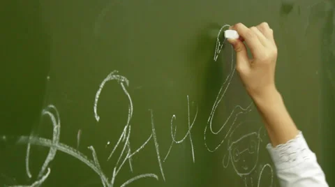 Children draw on a chalk board Stock Footage 30478556