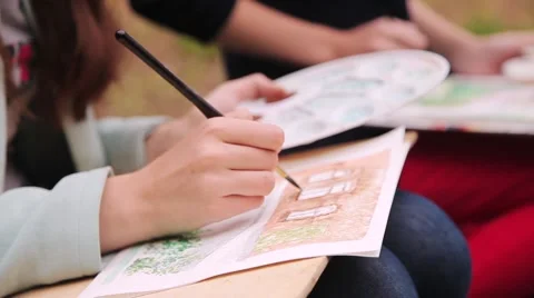 Children draw with crayons and paints Vídeos de archivo 54939383