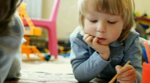 Children draw in home Video stock 43742908