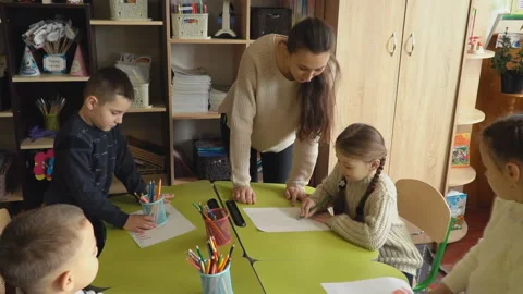 Children draw at school Stock Footage 103477843