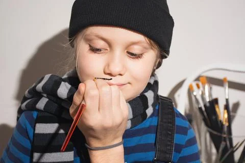Children draw on their faces Foto stock