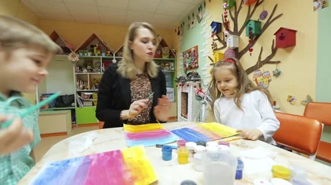 Children drawing in classroom Stock Footage 59604399