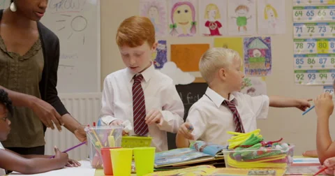 Children with drawing equipments in classroom Stock Footage 58573160