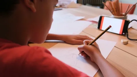 Children drawing writing with colored pencils at home concept education Stock Footage 219566419