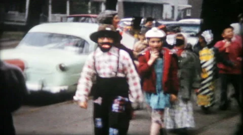 Children dress in Halloween costumes parade 1950s vintage film home movie 1219 Stock Footage