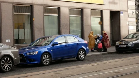 Children dressed as Three Wise Men go around Vienna, Austria Stock Footage 87504669