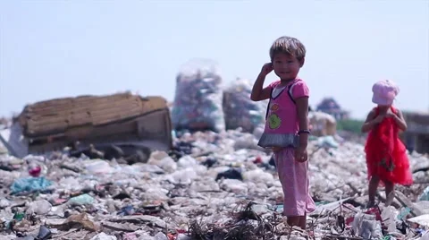 Children at the dump. Dispossessed orphans. Stock Footage