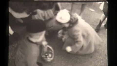 Children with Easter Baskets Collect Easter Egg Roll At the White House Stock Footage 130702501