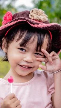 Children eat candy, causing tooth decay. Stock Photos