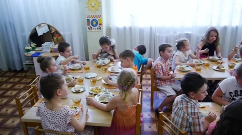 Children eat in elementary school Stock Footage 54453930